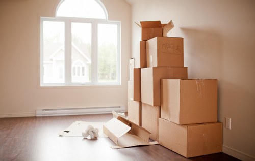 A moving checklist and boxed belongings prepared for relocation