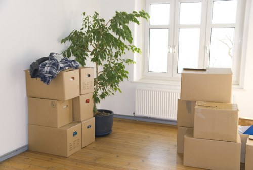 House move preparation with labelled boxes ready for collection in South London