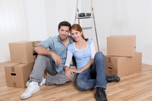 Flexible man with a van support in a busy city area