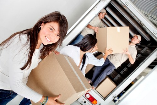Packed office items prepared for a cubic-yard based removal quote